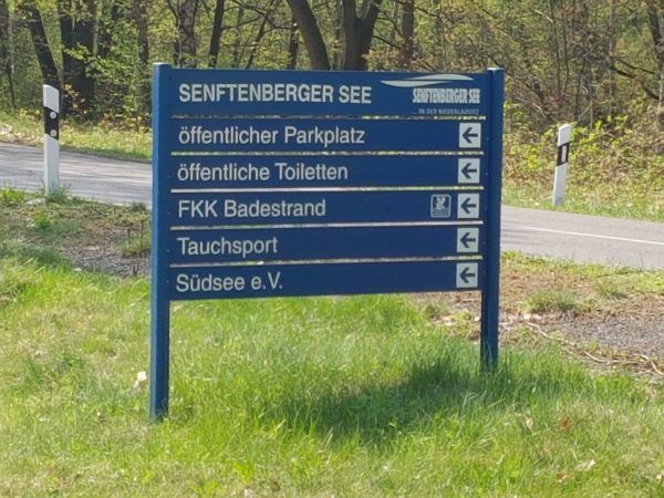 schild-anfahrt-tauchsport-dino